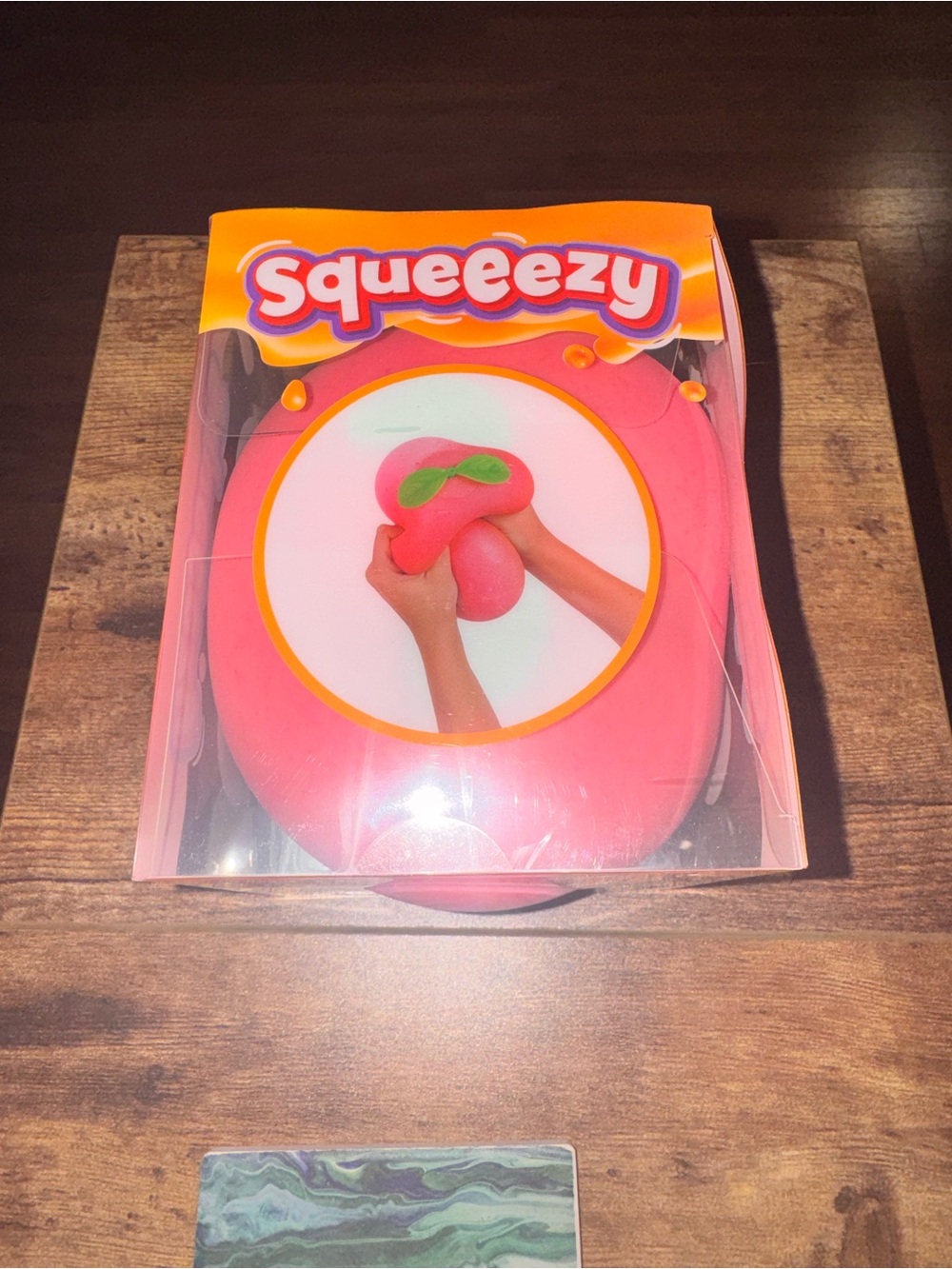 Squeezy Peach Squishy Toy - Picture 2 of 3